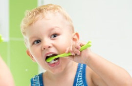 Kid Brushing His Teeth